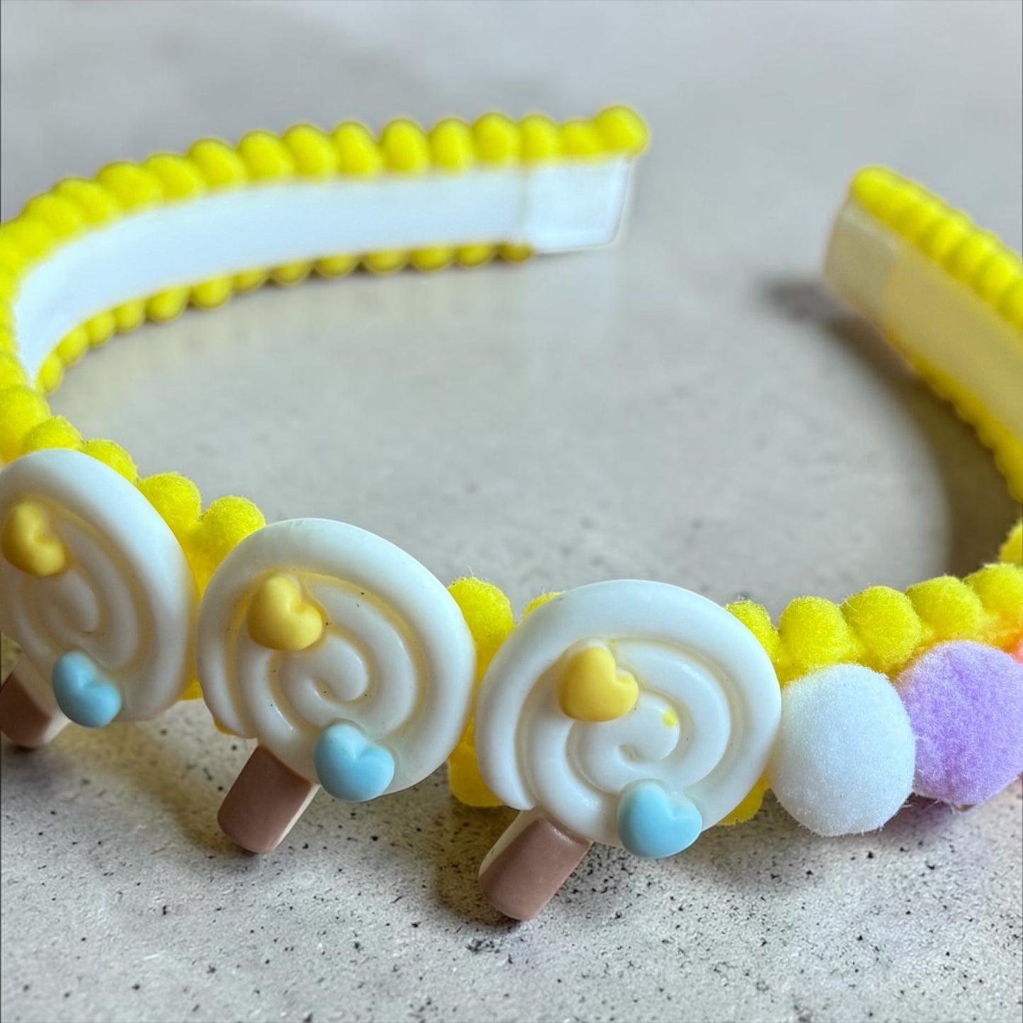 The Lollipop Lane Pom-Pom Band
