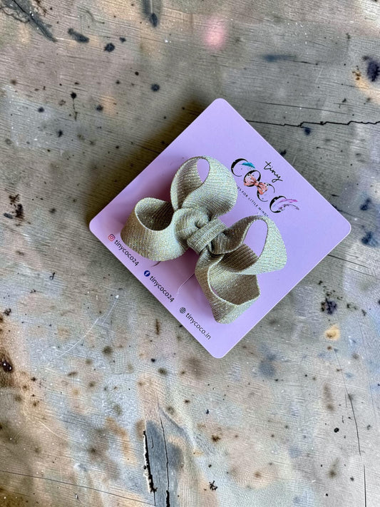 Tara Champagne Gold Shimmer Pinwheel Bow