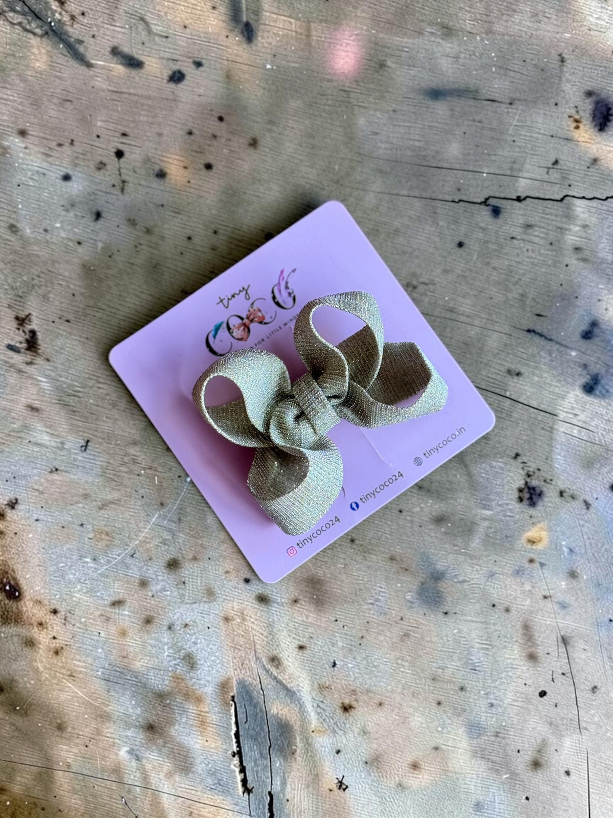 Tara Champagne Gold Shimmer Pinwheel Bow
