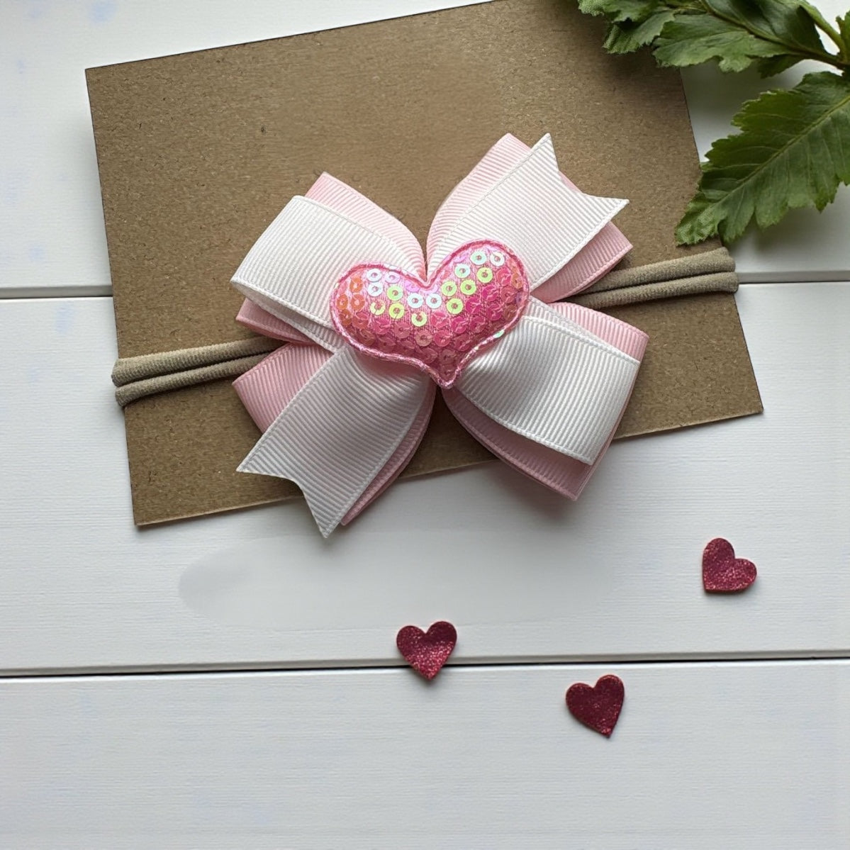 The "Luminous Love" Sequin Heart Bow